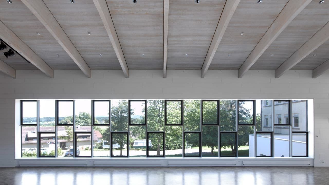 Betonträger im Verbund mit dem Holzbau